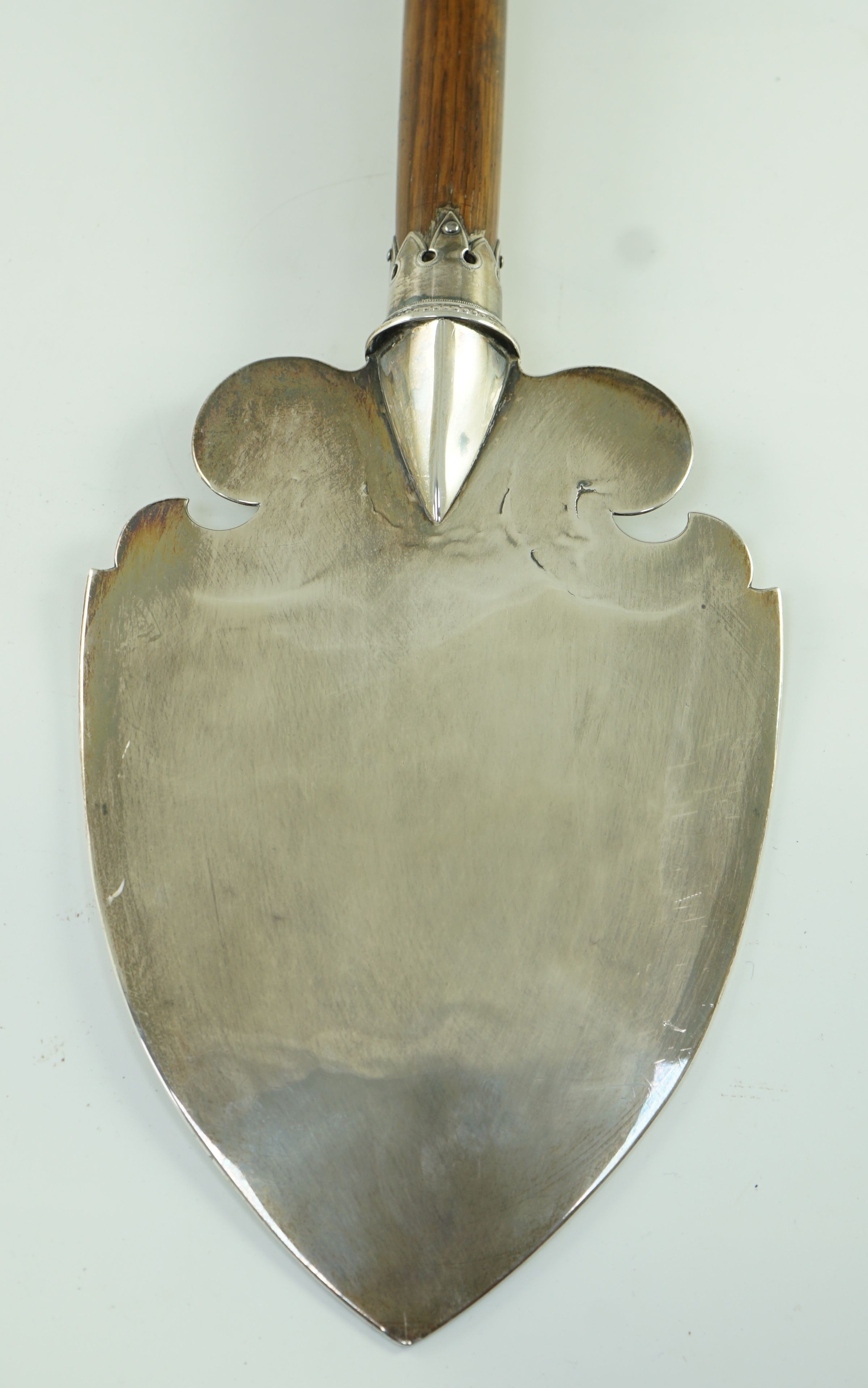 A large George V silver mounted oak presentation spade, by Vaughton & Sons